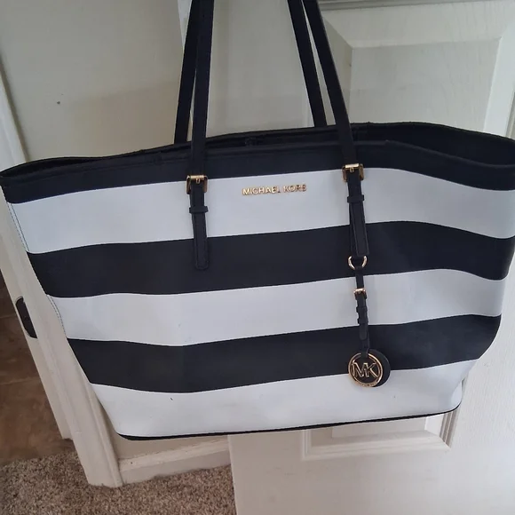 Michael Kors Navy Blue and White Striped Tote with Gold Accents. - Picture 1 of 6